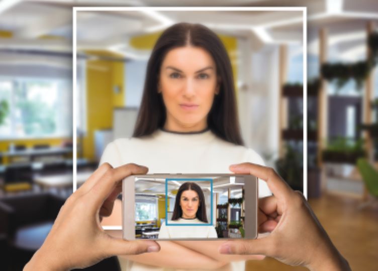 Correct UK passport photo framing: head centered, neutral expression, space above head